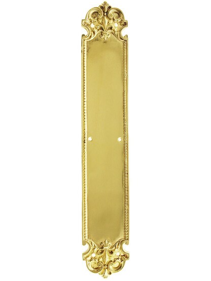 French Baroque Push Plate In Polished Brass.